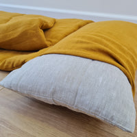 Special listing for Casey Heitmann one 38"L x 26" W hemp sleeping bag with pillow in mustard linen fabric, with white thread embroidery of the Rowen name, with a grey mat inside 2.3" thick