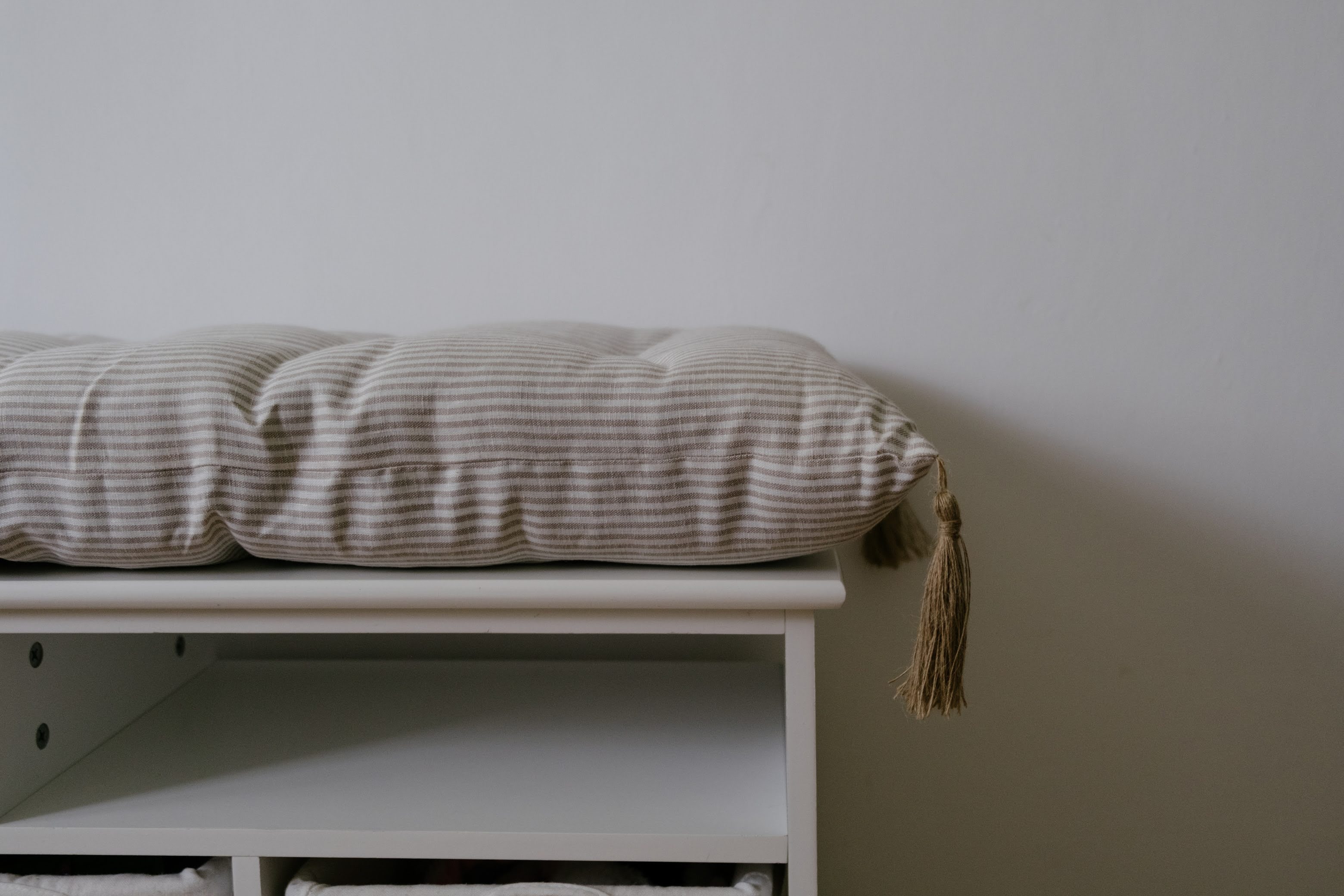Special listing for Kate Roden two 35" x 14" and one 48" x 16" hemp cushions without tassels in natural linen fabric in stripe