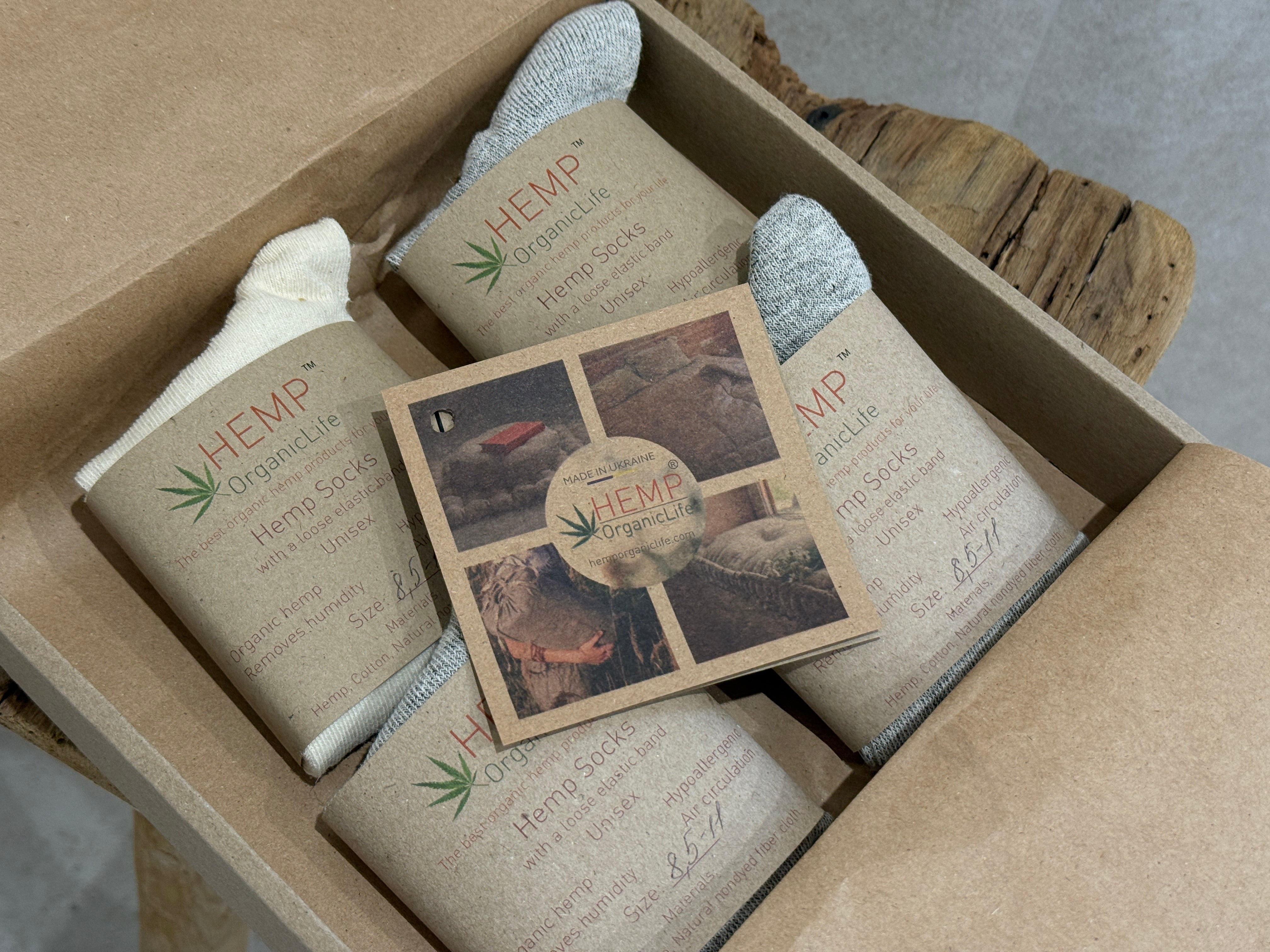 Hemp products in a box with visible branding and packaging details.
