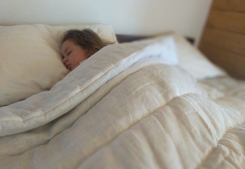 Side-by-side comparison of hemp and organic cotton fabrics used in sustainable kitchen aprons, highlighting weave texture and environmental benefits.