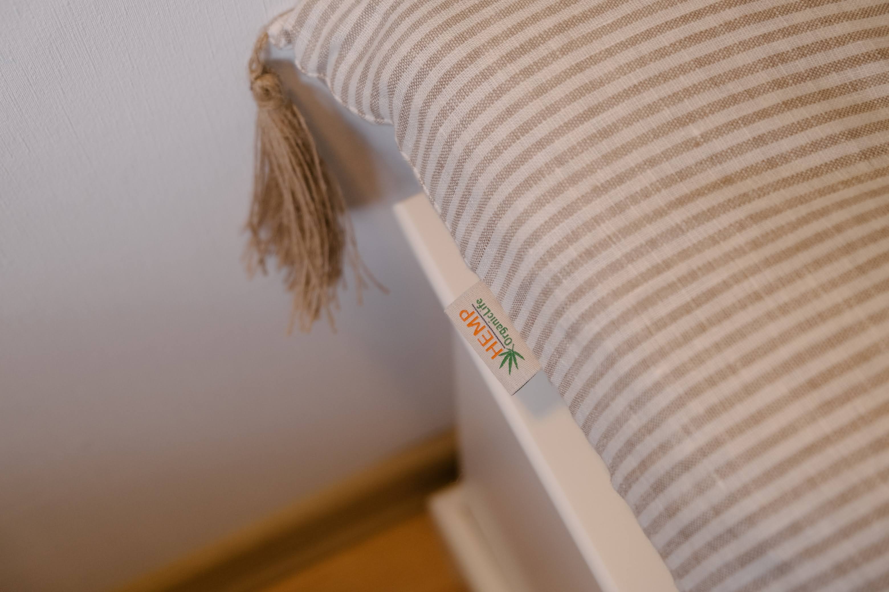 Special listing for Kate Roden two 35" x 14" and one 48" x 16" hemp cushions without tassels in natural linen fabric in stripe
